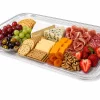 Clear rectangular platter base with cheese, grapes and charcuterie